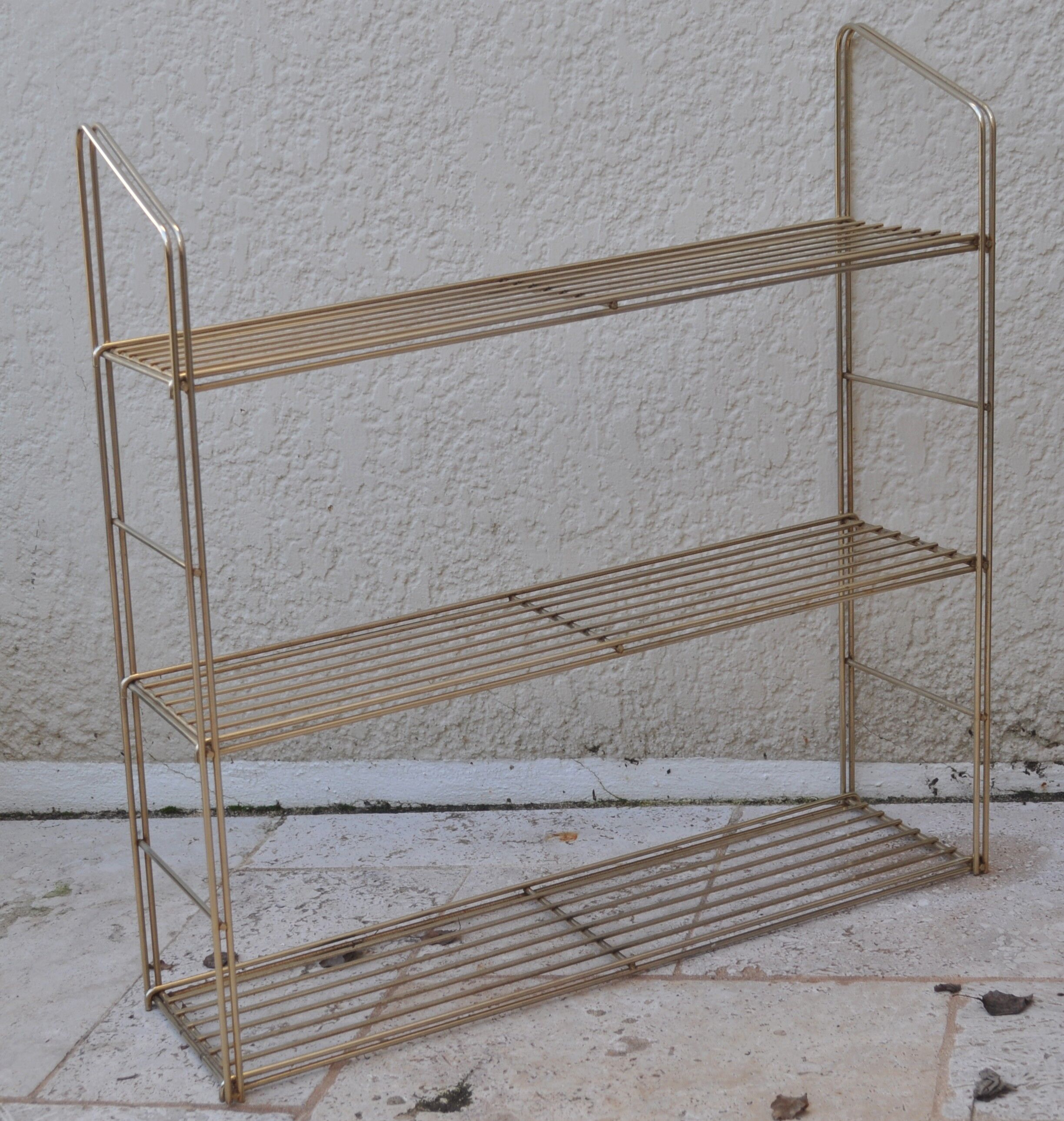 Vintage all-metal string shelf