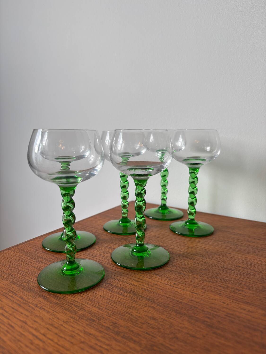 Set of green twisted stem white wine glasses – blown glass
