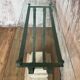 Glass and metal console with antique patina