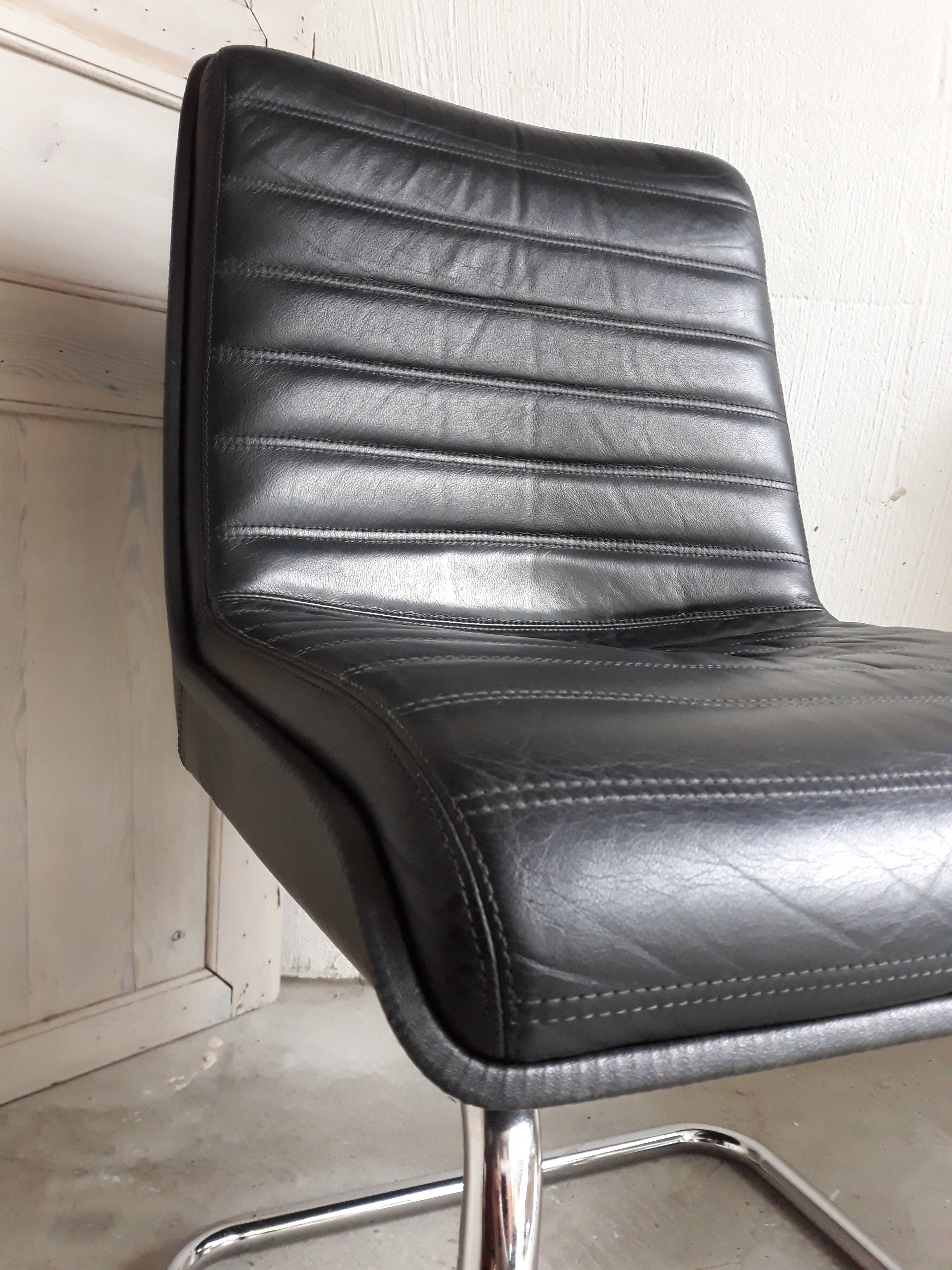 Vintage black leather armchair