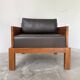 Modernist armchair in exotic wood and leather
