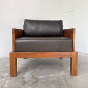 Fauteuil moderniste bois exotique et cuir