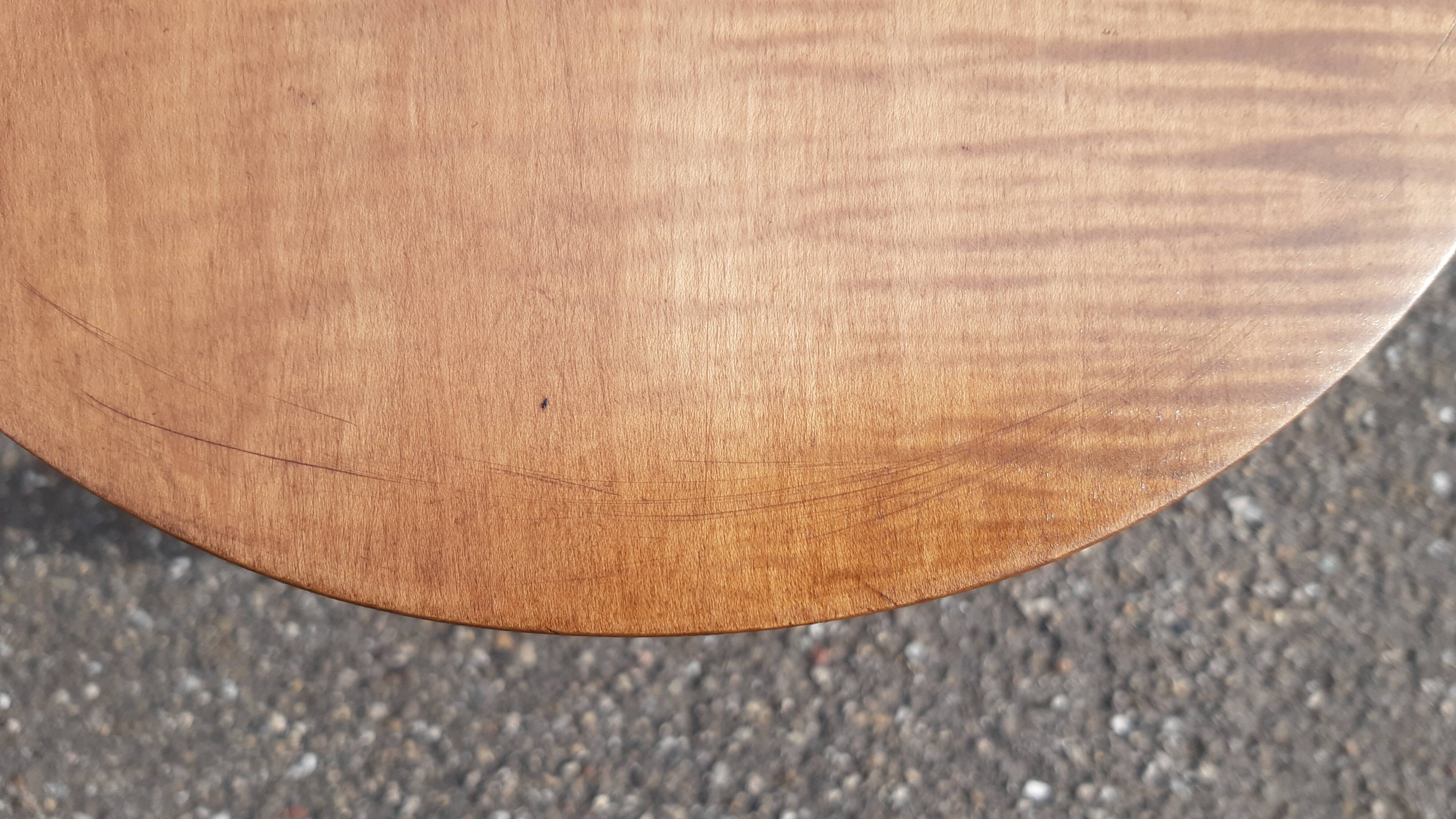 Wooden tripod stool with turned legs