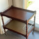 Vintage wooden and gilded brass rolling dessert trolley