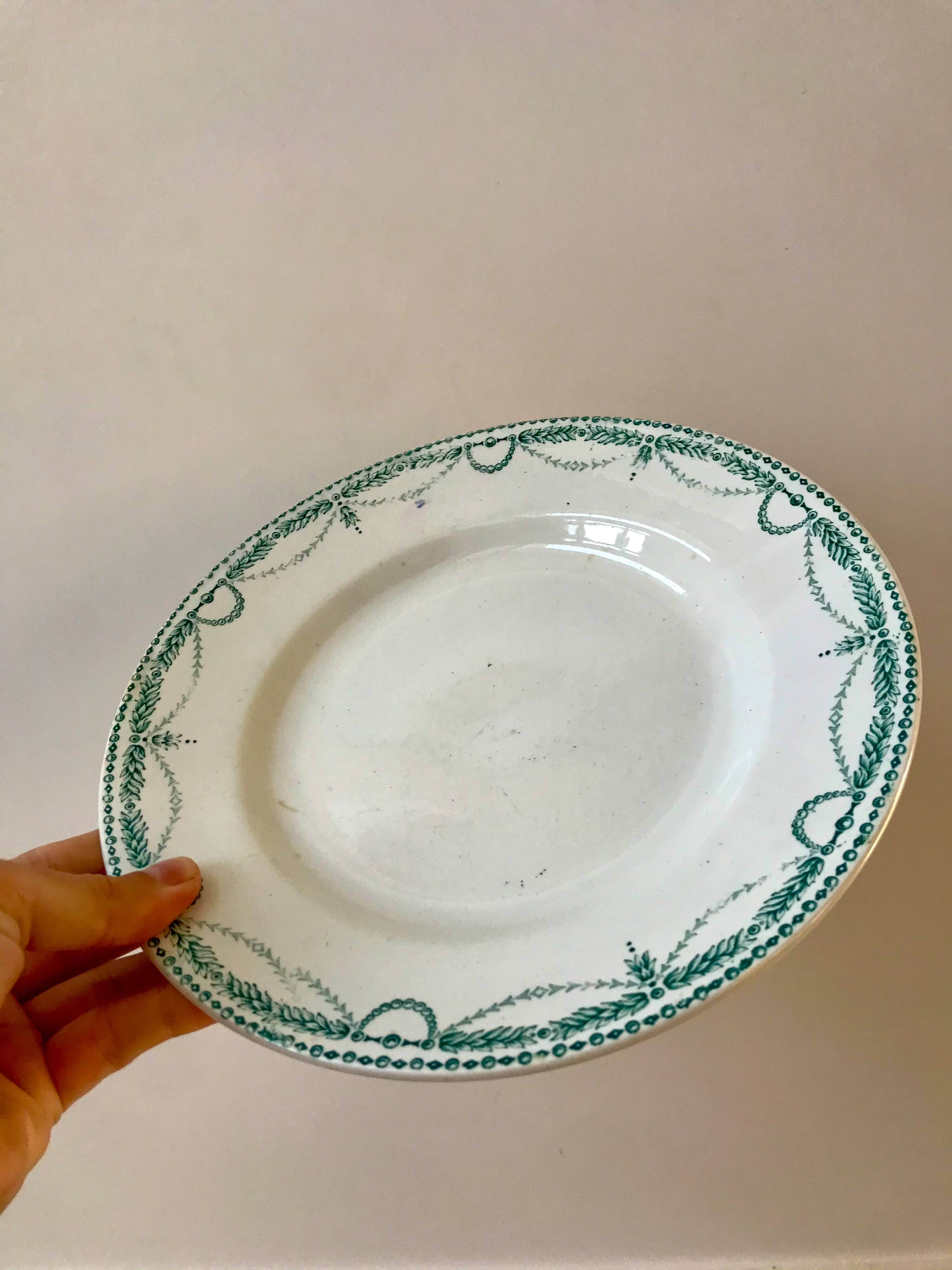 set of 4 flat plates in Terre de Fer Saint Amand model René 19th century