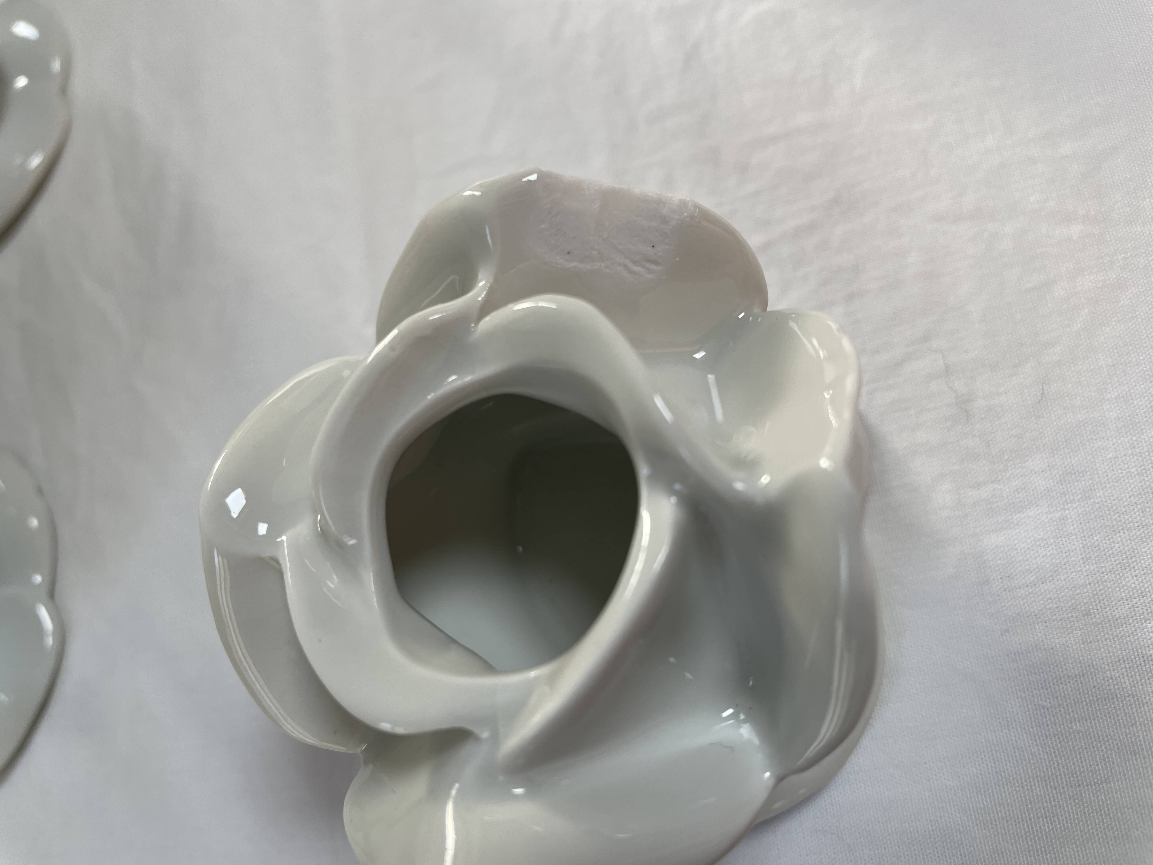 White porcelain rose shaped candle holders