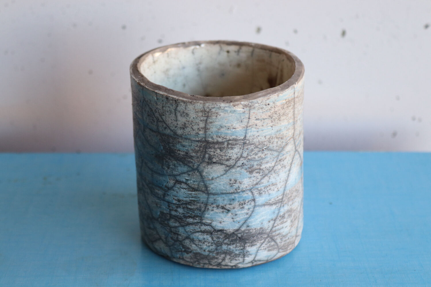 Blue raku ceramic cylindrical vase