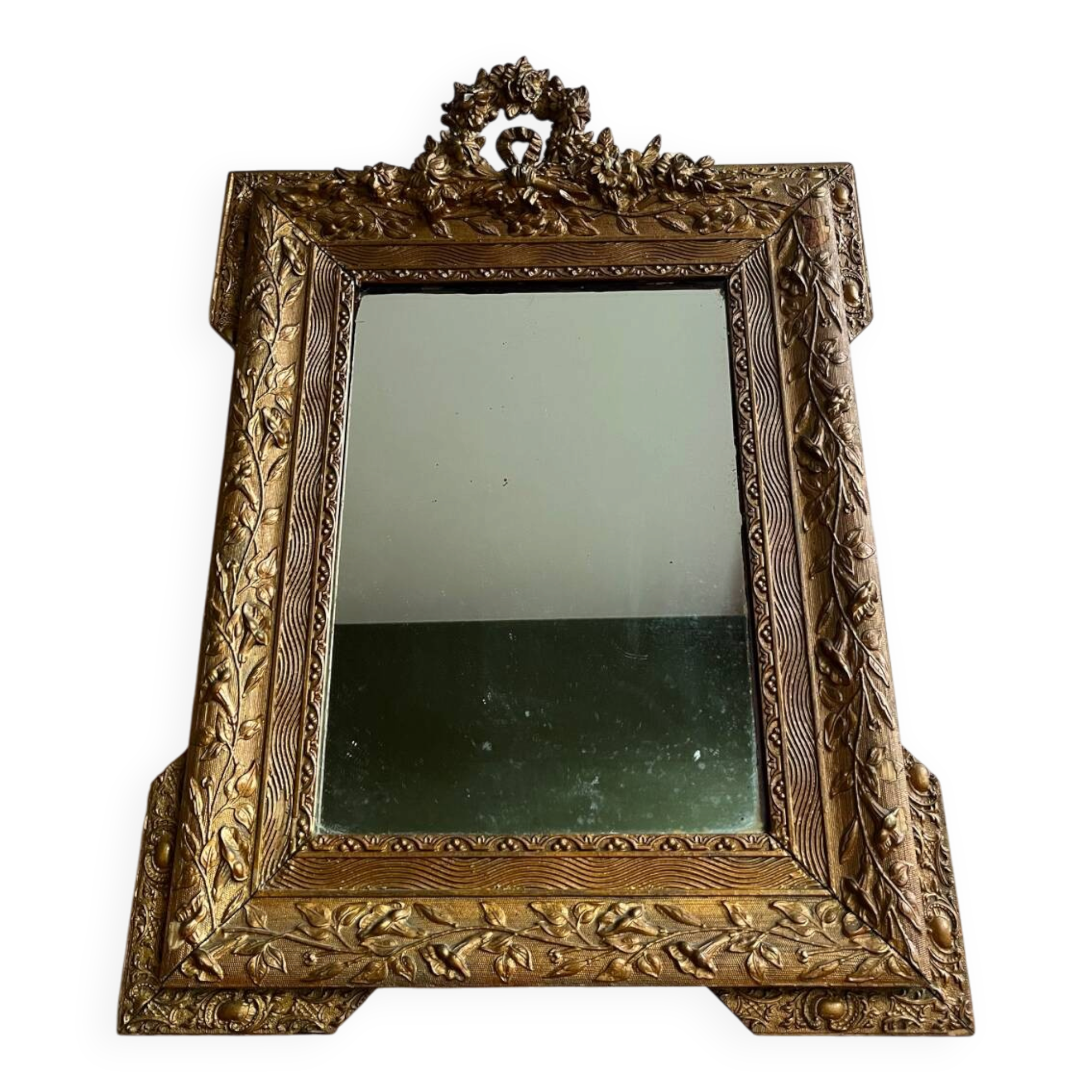 Golden trumeau mirror for fireplace, late 19th century, with sculpted pediment.