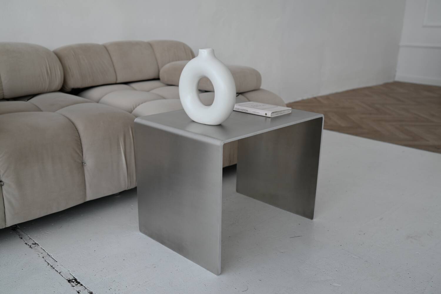 Minimalist brushed aluminum side table