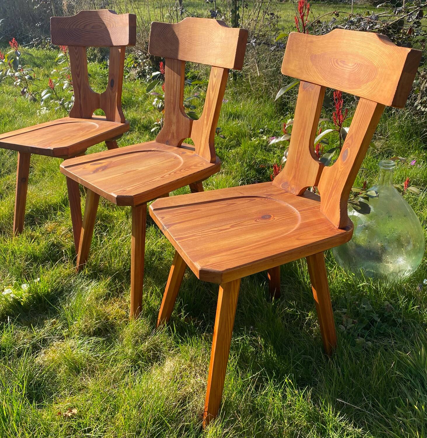 Three solid wood chairs