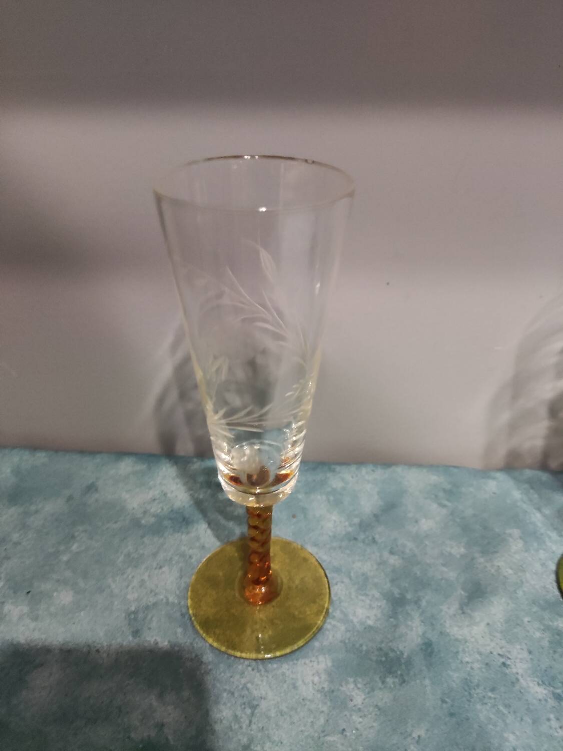 Four vintage stemmed glasses