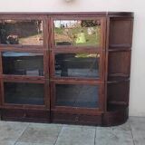 Large modular vintage display cabinet pierre cruiege for martin du