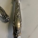 Leg cutlery set. Silver handles.