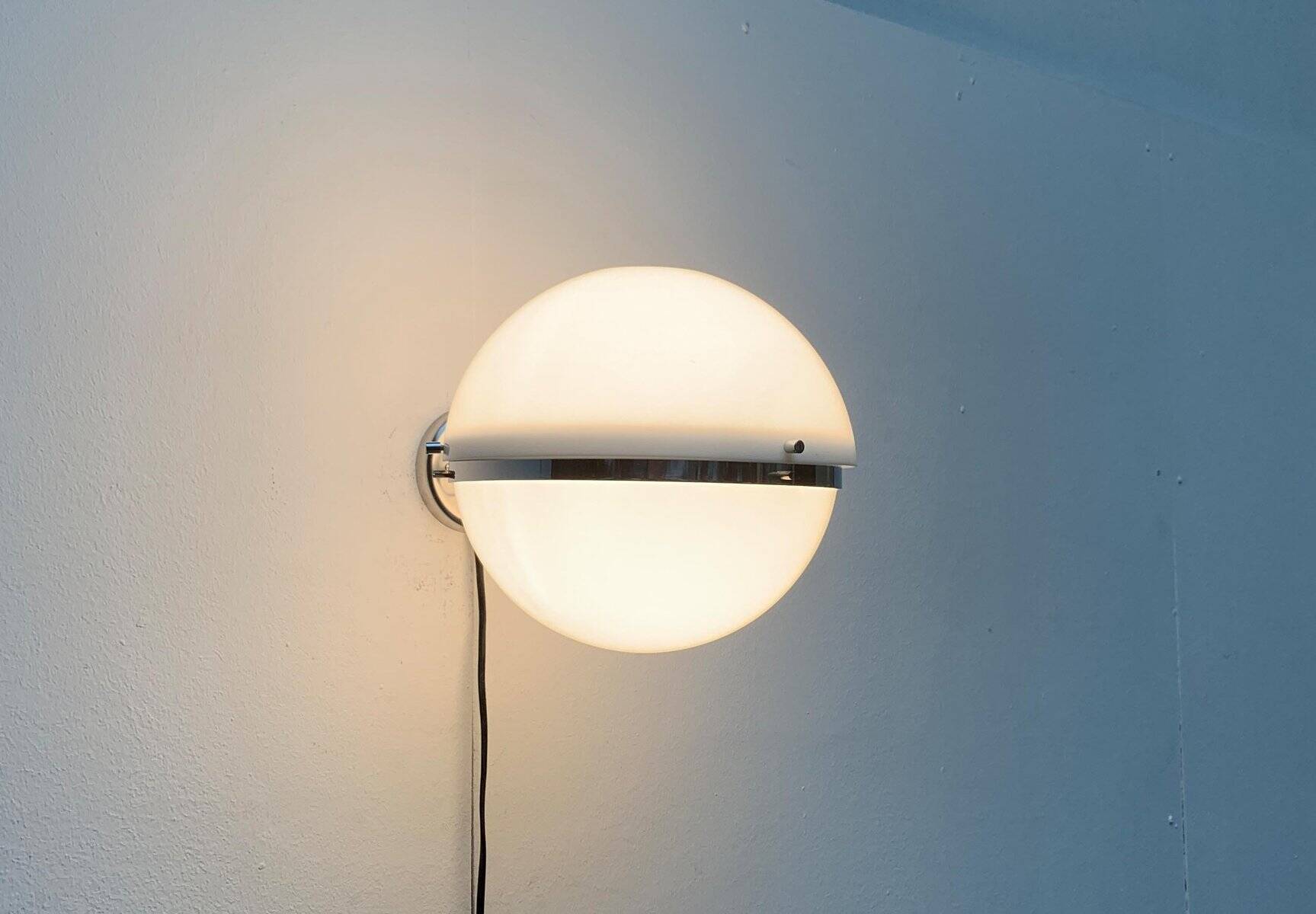 Mid-century Italian space age spherical wall light by Guzzini.