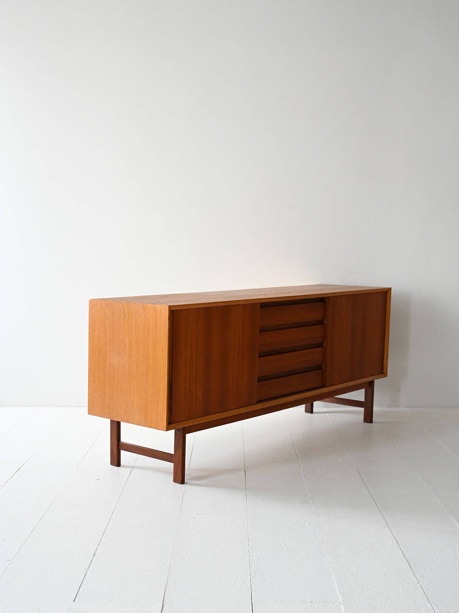 Vintage Scandinavian teak sideboard with metal-lined drawers