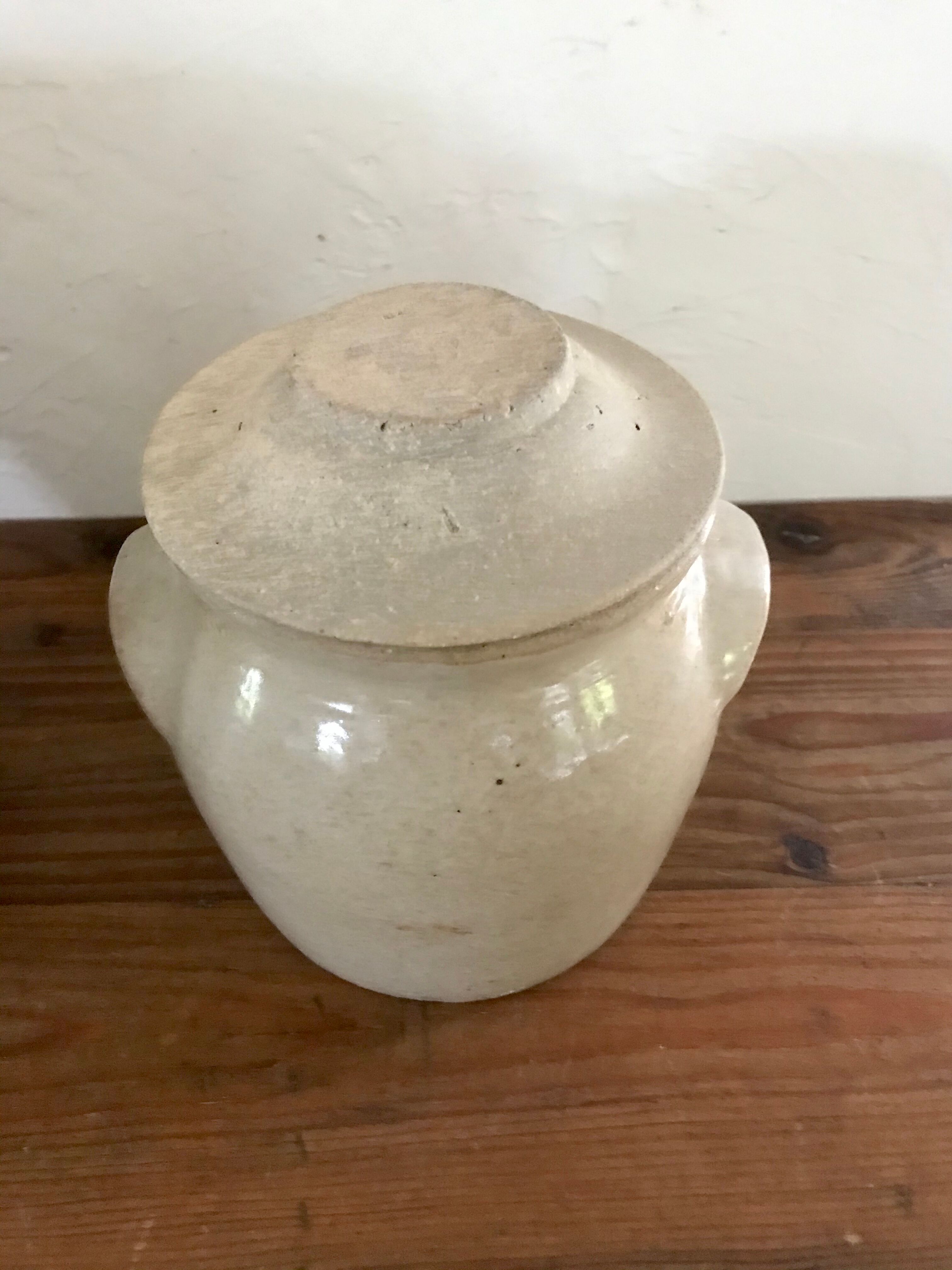 2 enamelled sandstone pots