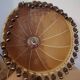 Large hanging pendant light with a burlap and pom-pom style