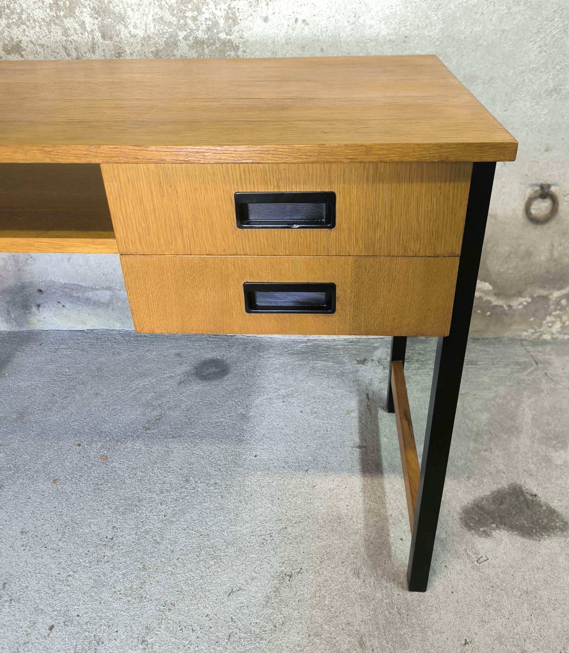 Vintage desk in modernist style made of wood.