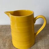 Old yellow porcelain pitcher stamped Saint Clément