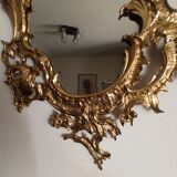 Antique mirror in gilded metal