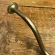 Wall-mounted brass hook