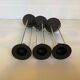 Vintage black candlestick trio
