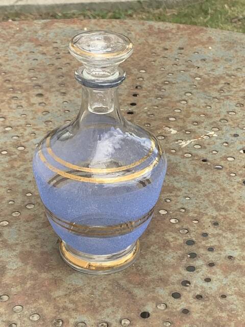 Blue granite glass carafe with vintage gold trim.