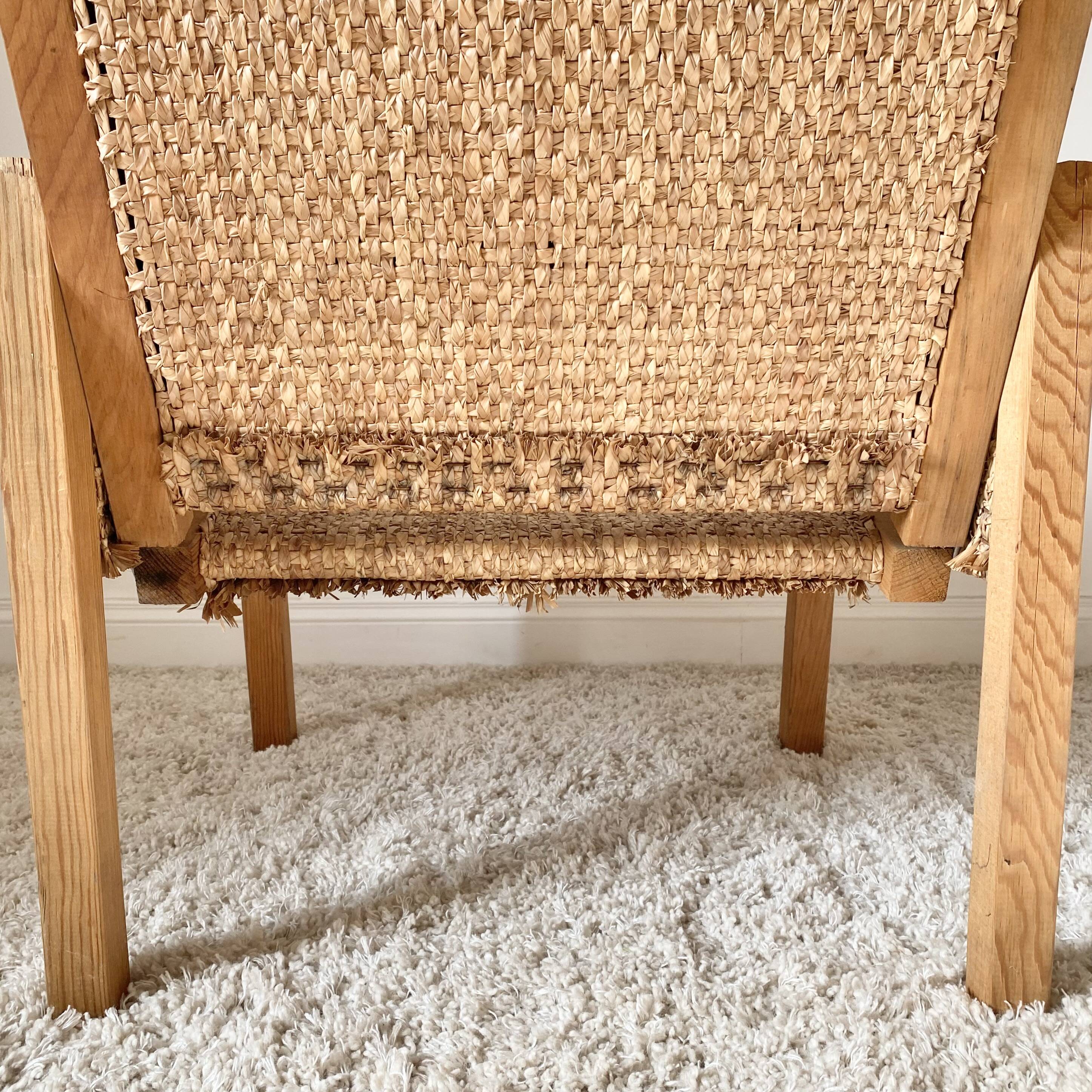 Vintage modernist straw armchair