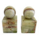 Pair of sculptural mid-century bookends in Onyx, Italy.