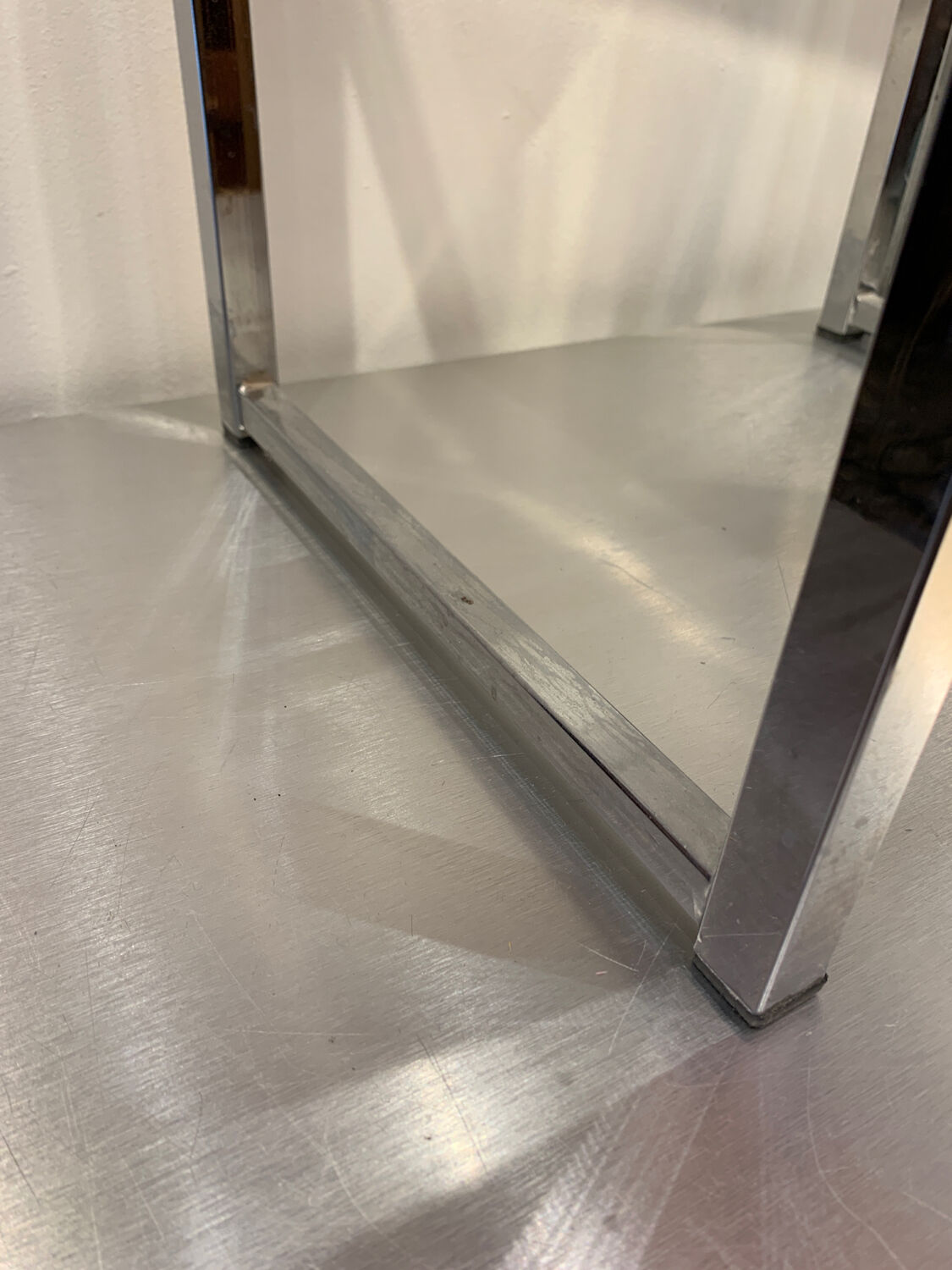 Pair of vintage chrome and acrylic glass bedside tables