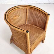 Pair of cabriolet armchairs in wicker and black edging
