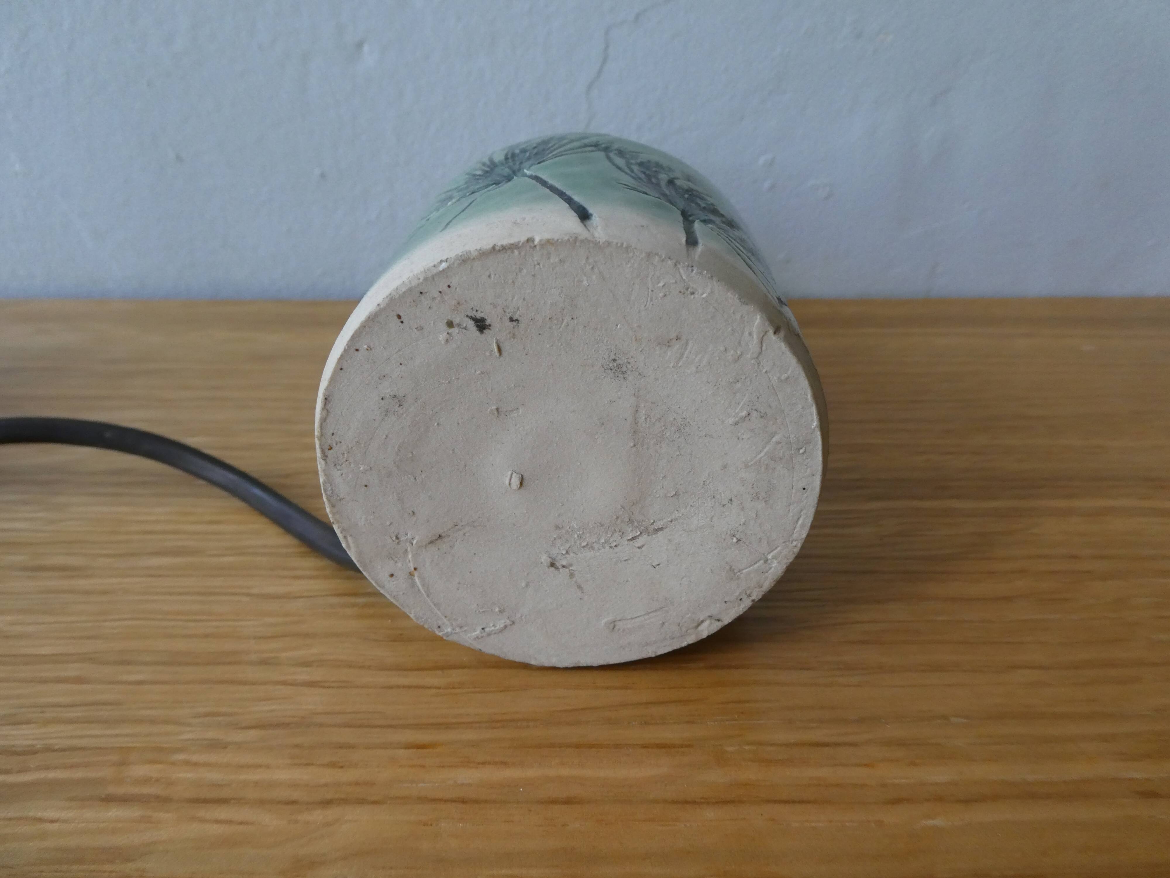 Ceramic lamp, herbarium decoration and fiber blinds