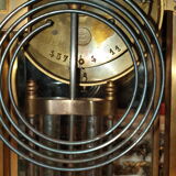 Cage pendulum with its double mercury bulb pendulum.