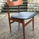 Scandinavian chair sitting in leatherette