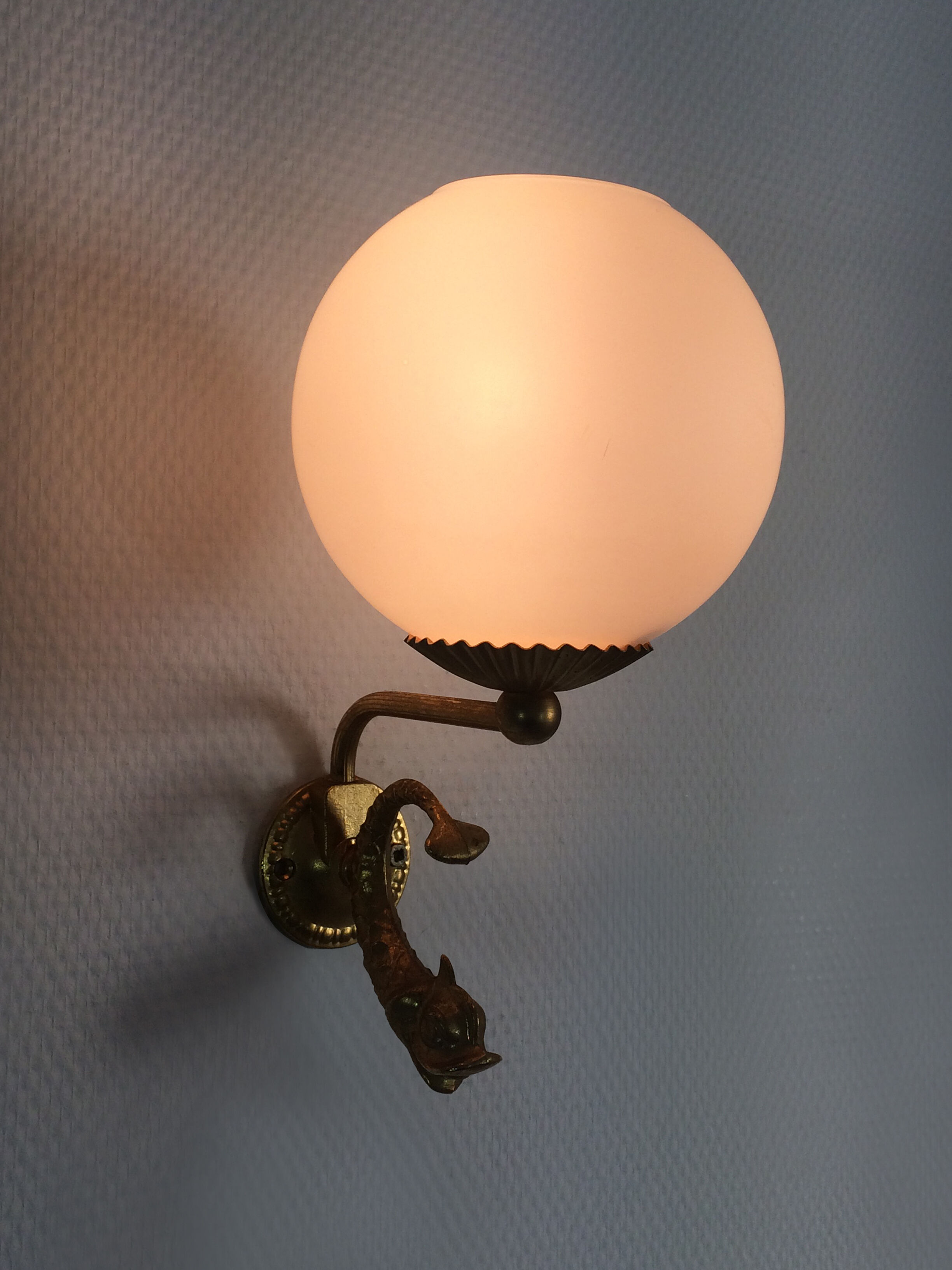 Pair of wall lamps with carp fish, brass and white opaline globe 1960