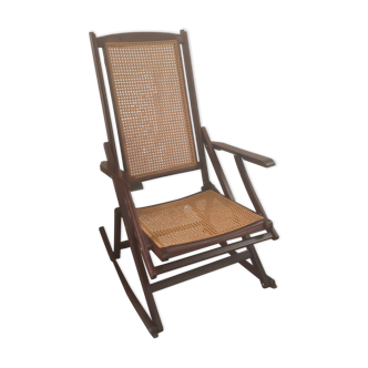 Folding wooden rocking chair and cannage from the 70s