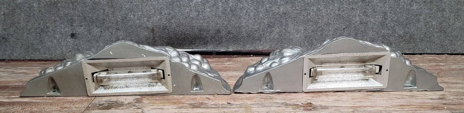 Pair of Art Deco style wall sconces in silvered plaster
