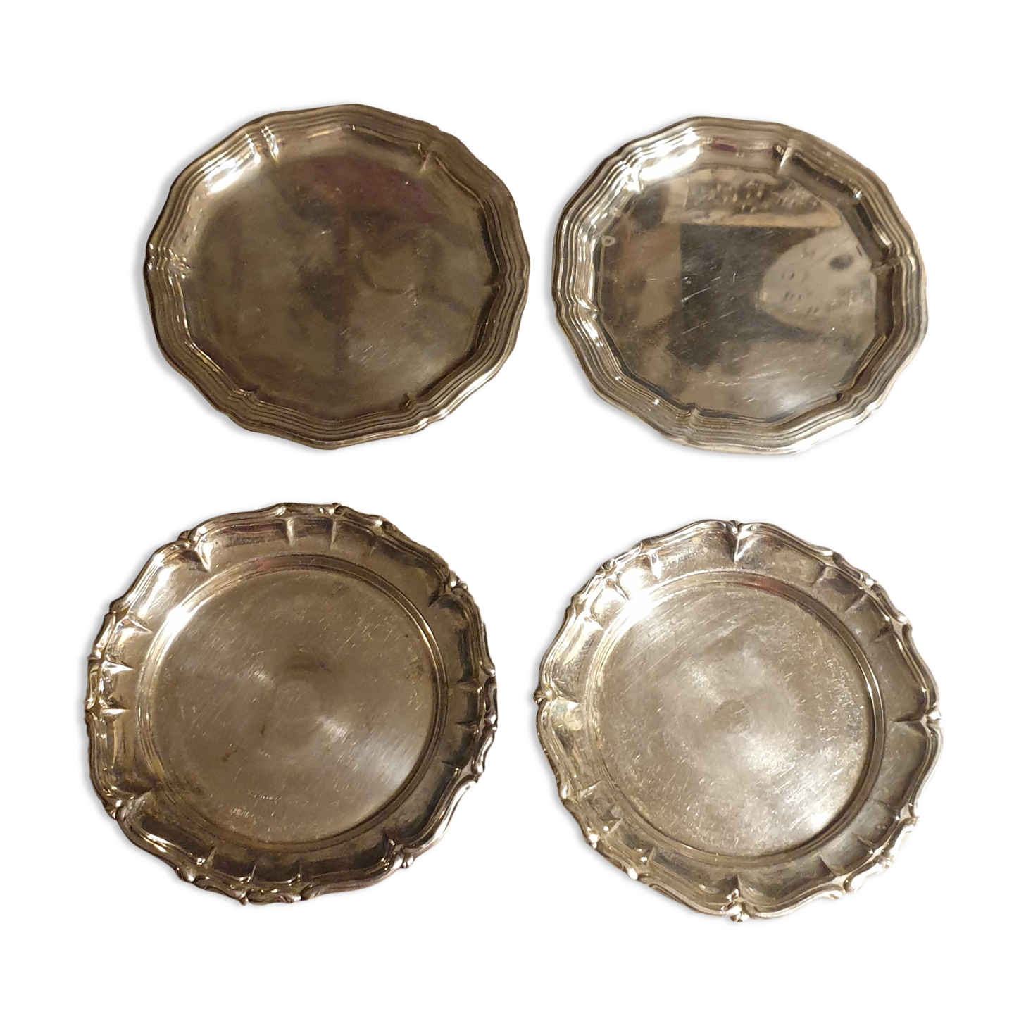 4 carved silver metal coasters