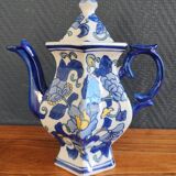 Cobalt blue teapot with flower pattern. Hexagonal teapot