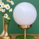 Vintage globe table lamp in white opaline.