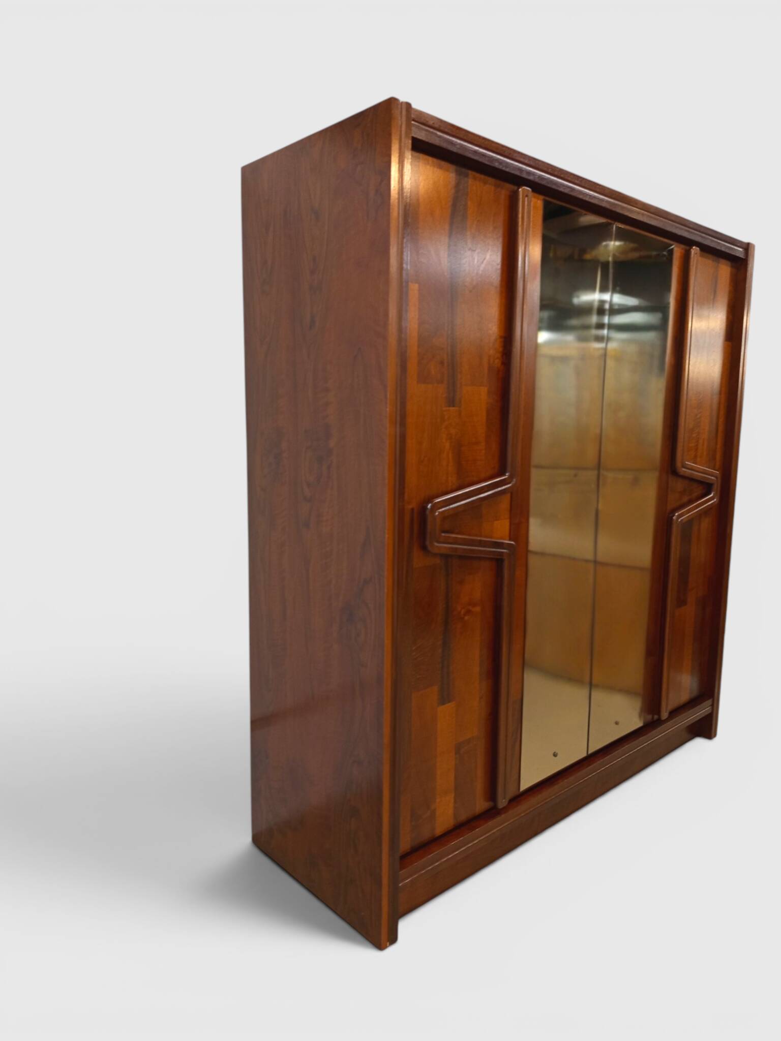 Modernist mahogany wardrobe with smoked mirrors (late 1970s)
