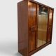 Modernist mahogany wardrobe with smoked mirrors (late 1970s)