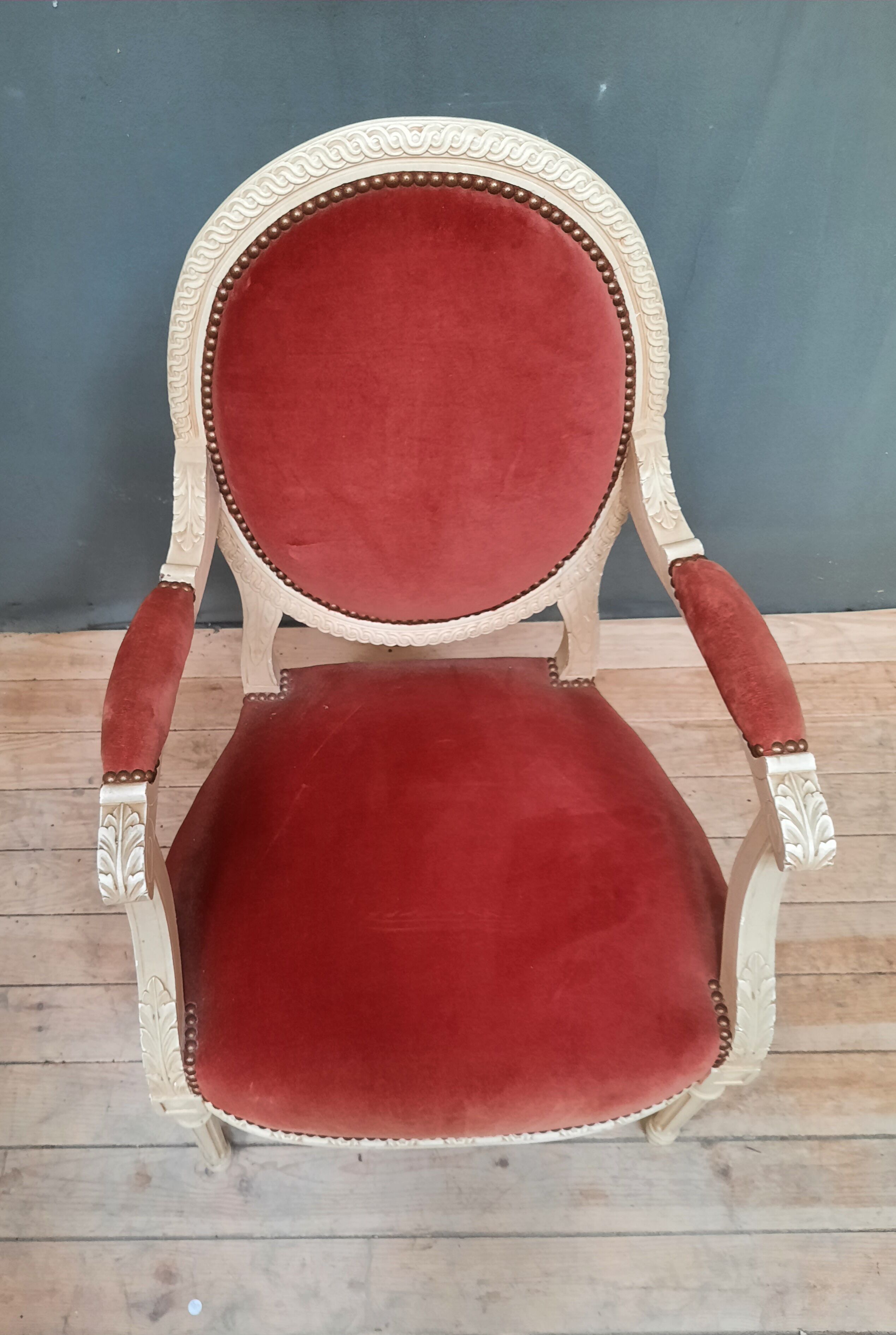 Louis XVI style armchair in white lacquered wood