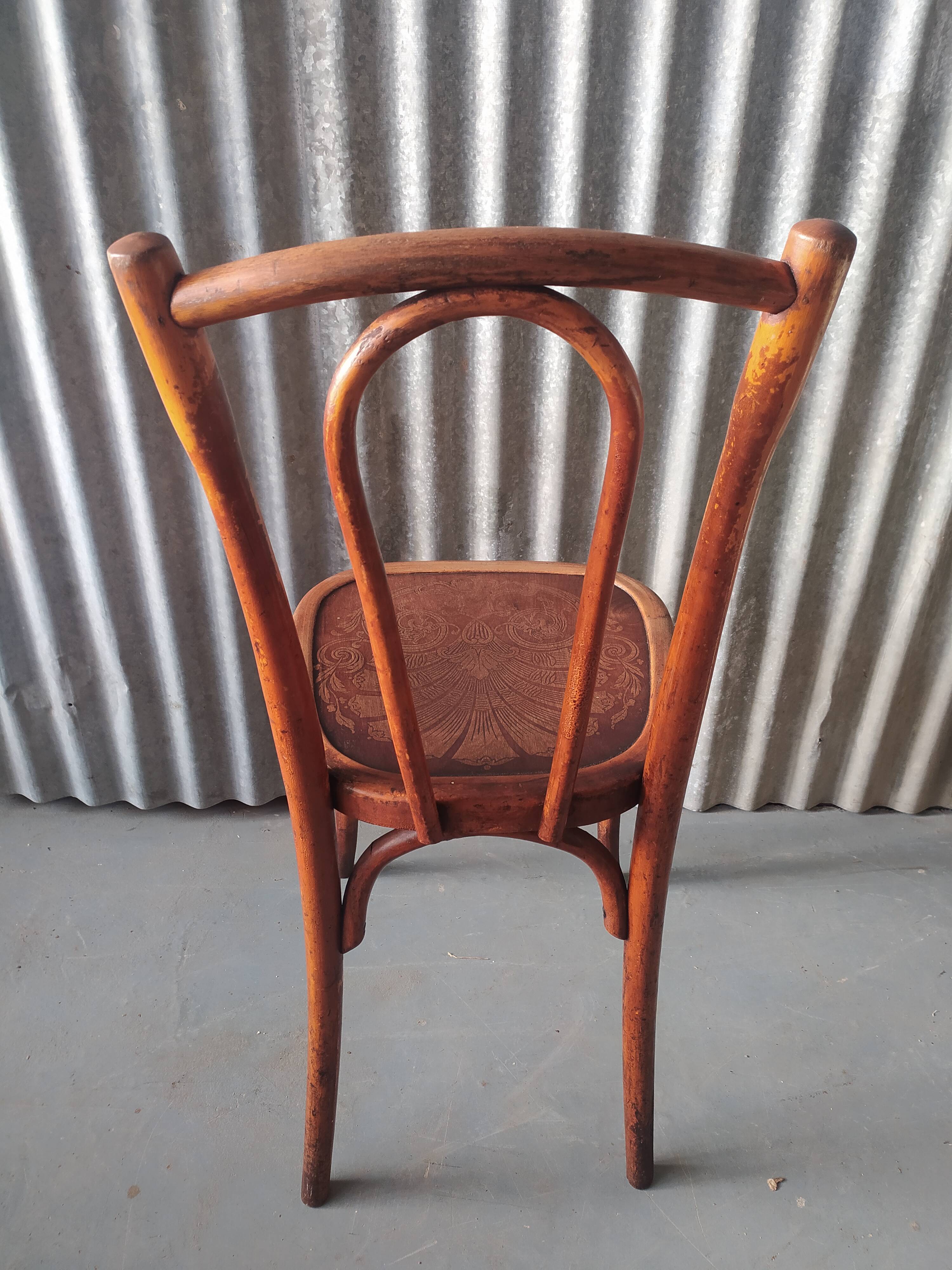 Curved wooden bistro chair
