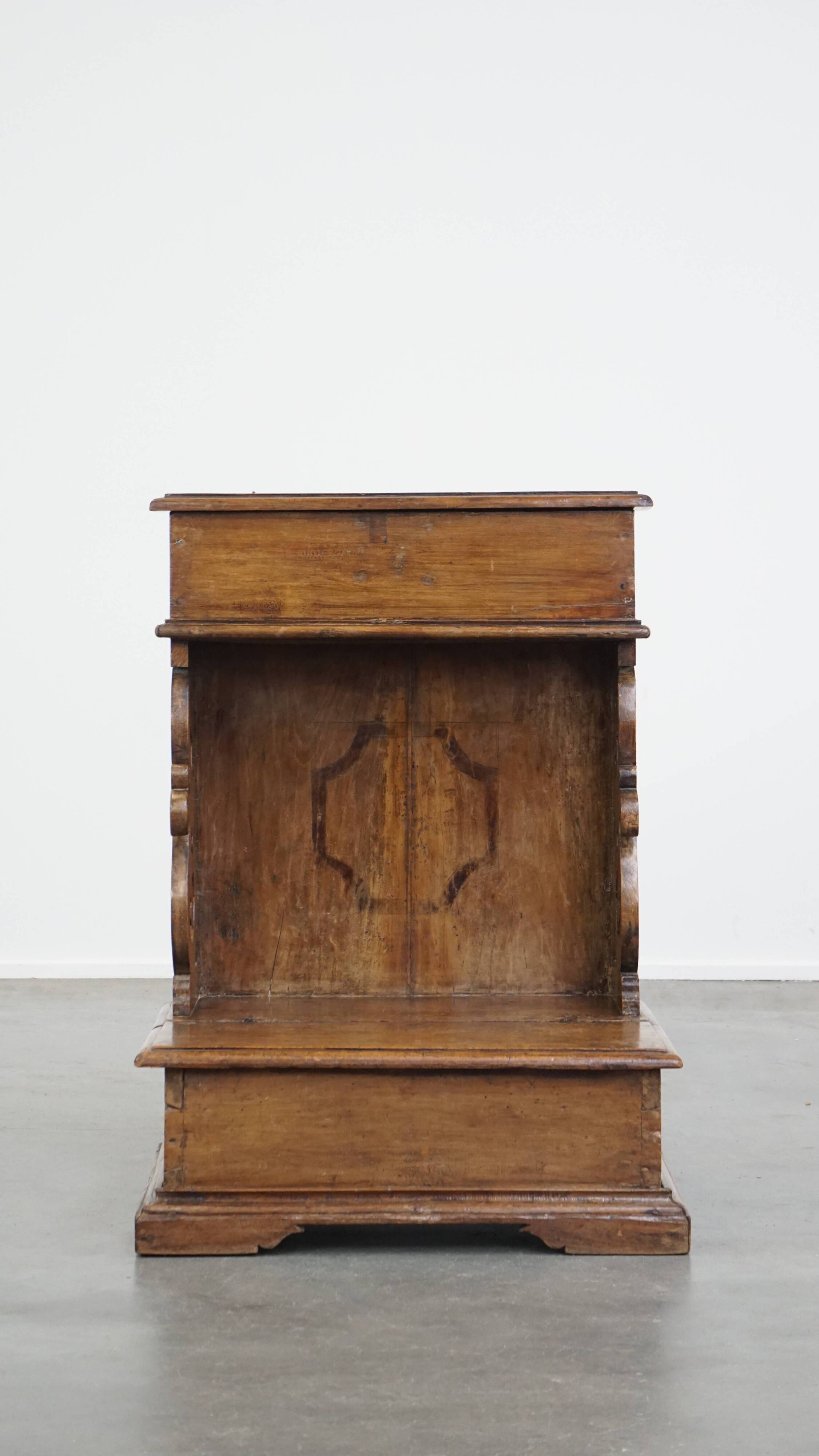 Antique pinewood church pew with storage compartments from the 18th century