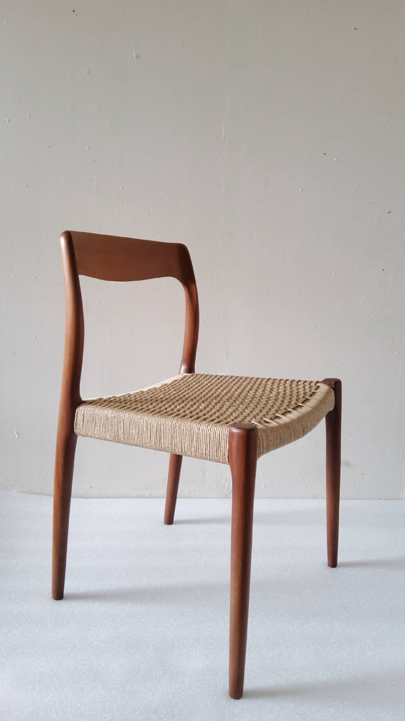 Danish dining chairs in wood and paper cord