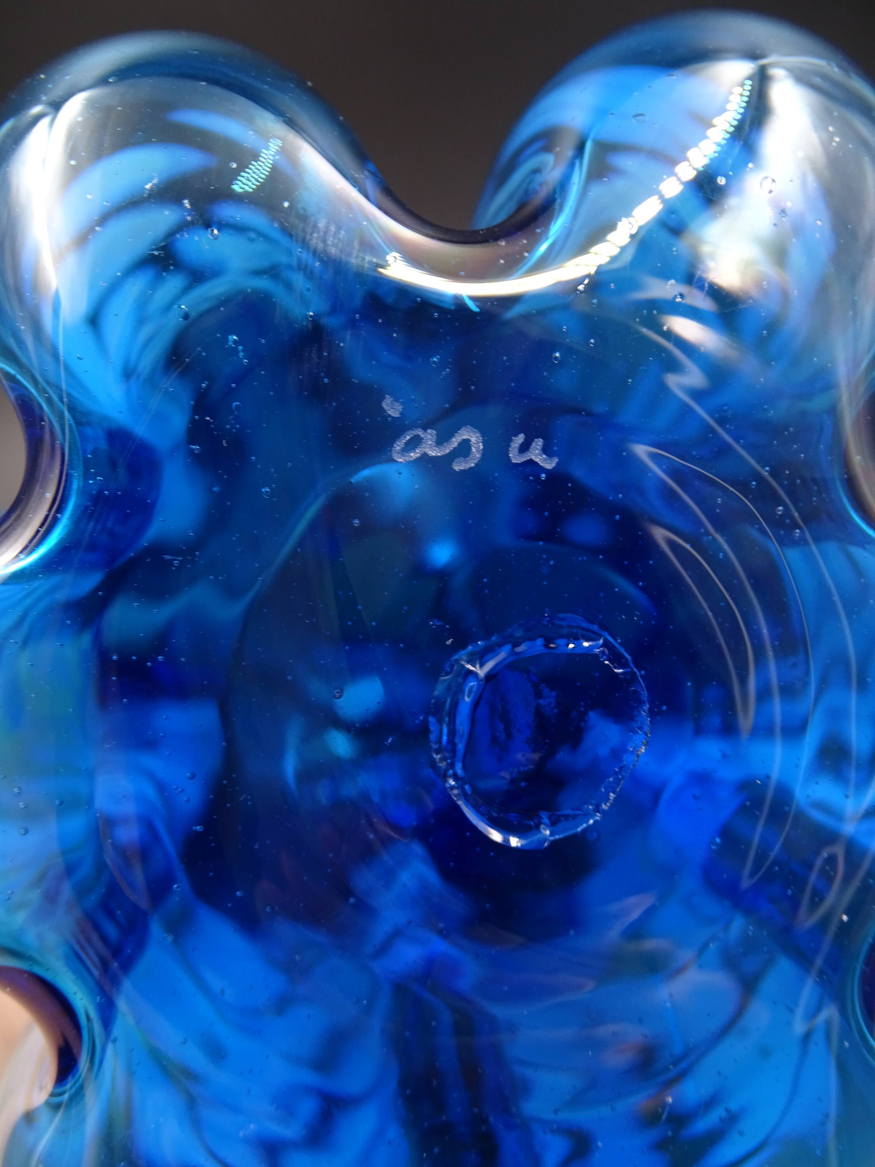 Blue glass vase and touches of white