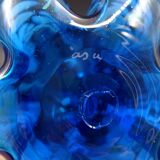 Blue glass vase and touches of white