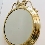 Miroir décoratif oval en laiton orné d'un important noeud torsadé