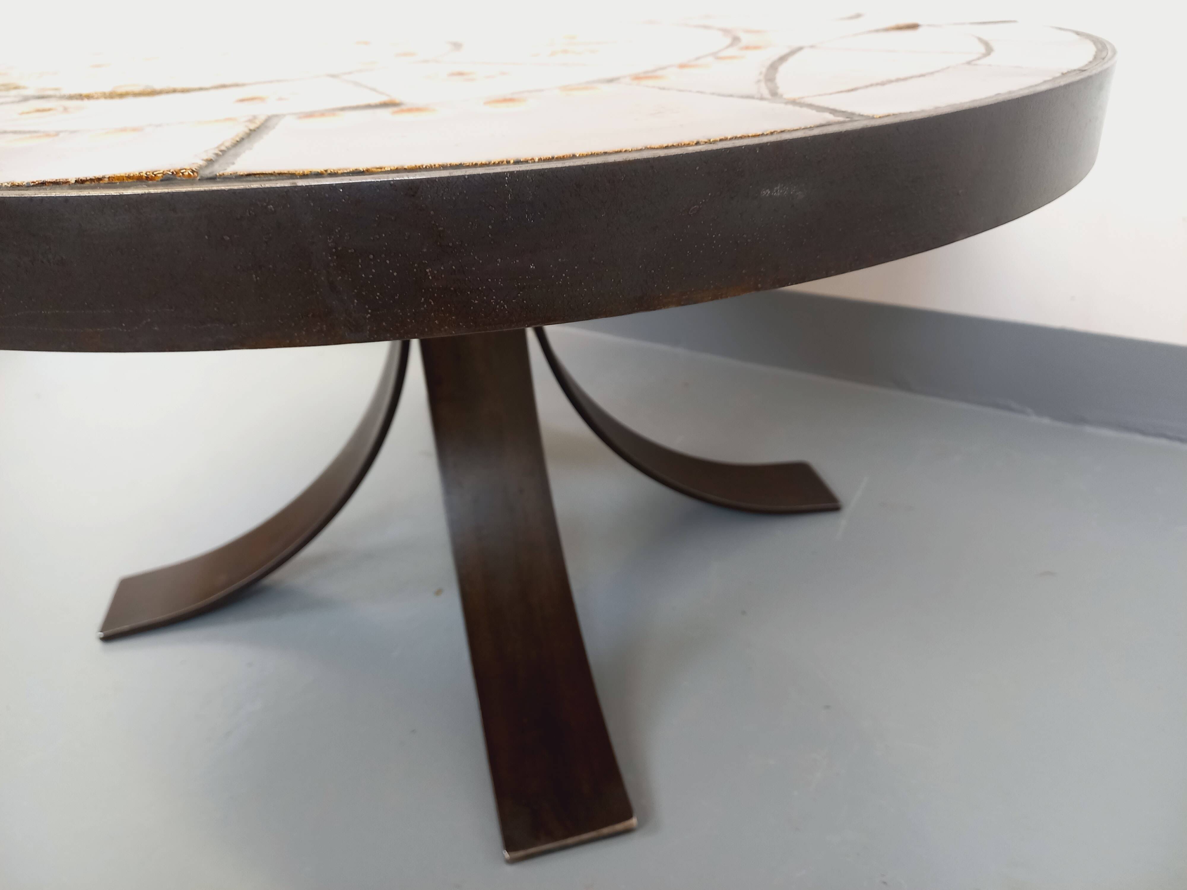 Vintage round coffee table from the 60s 70s by Raymond Corroyez in ceramic